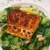 Roasted Chilean Sea Bass over Escarole and Beans